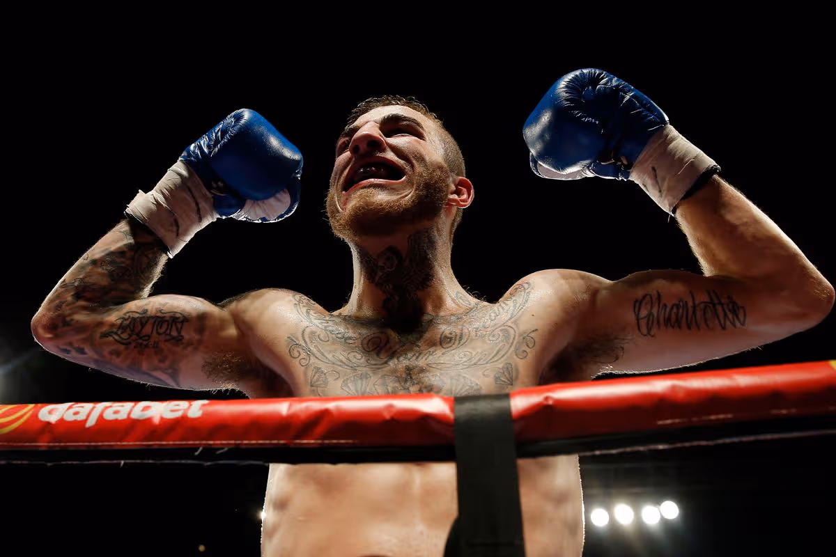 Sam Eggington bloodied and determined after a hard fight